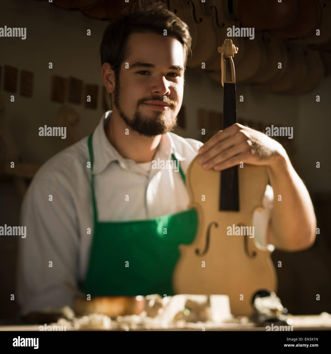 violin maker in the Stock Photo Alamy