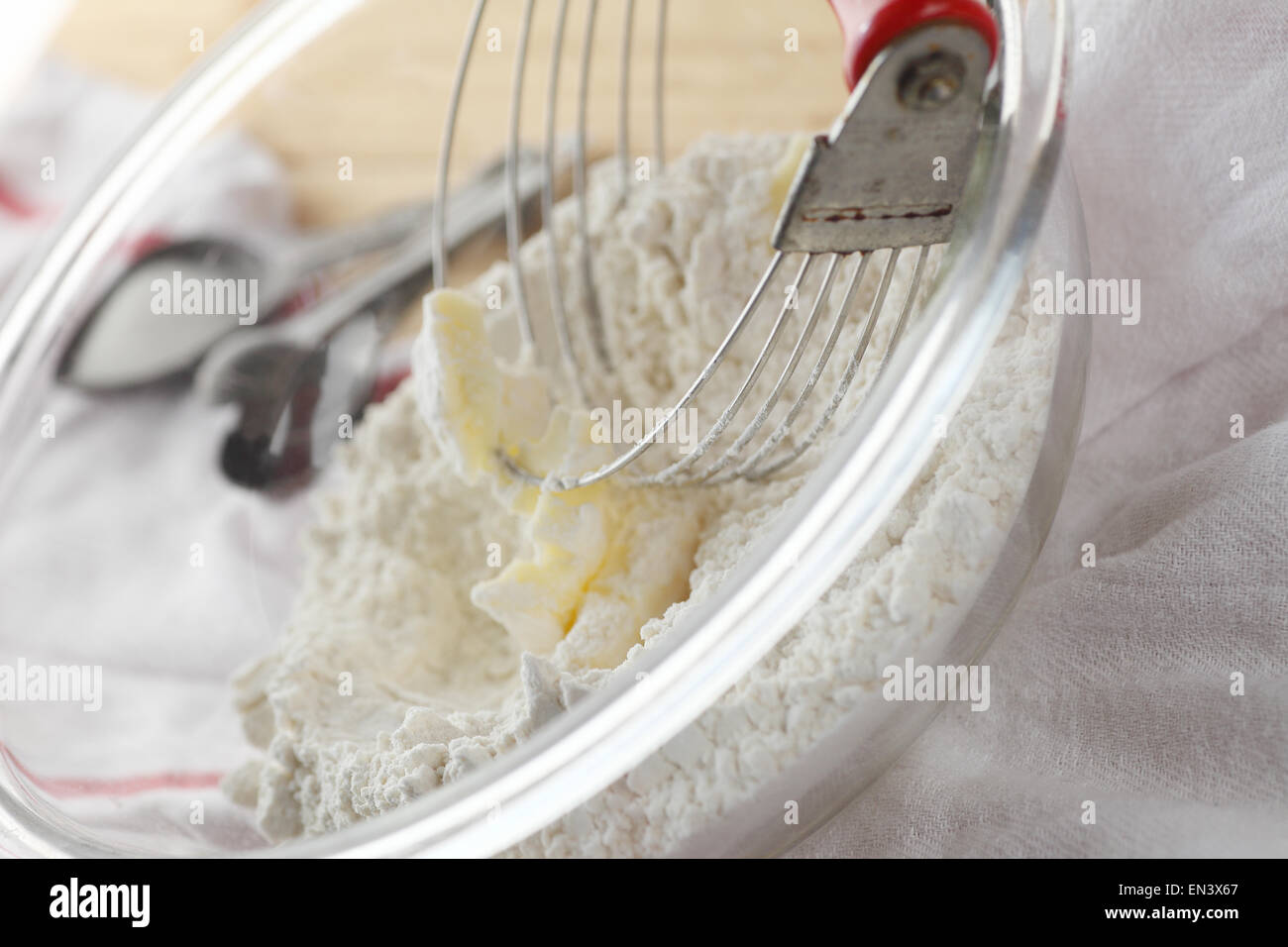 Using a pastry blender to incorporate butter into flour, vintage