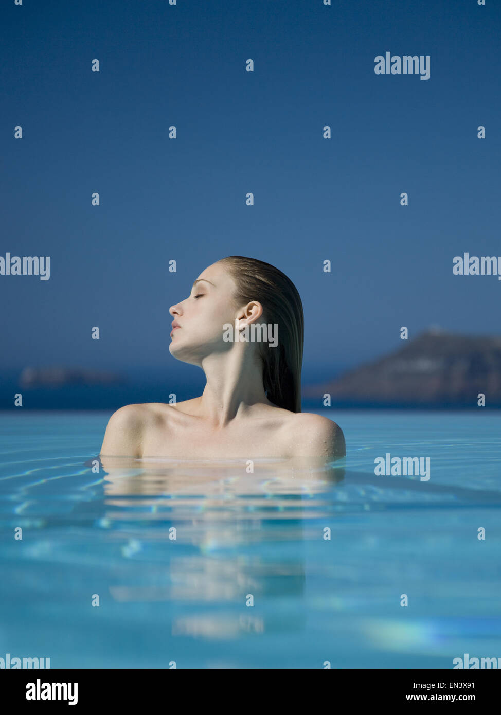 Woman in pool Stock Photo