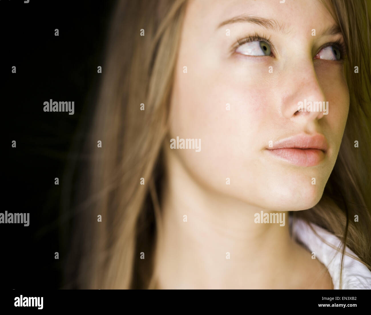Person thinking smiling smirk hi-res stock photography and images - Alamy