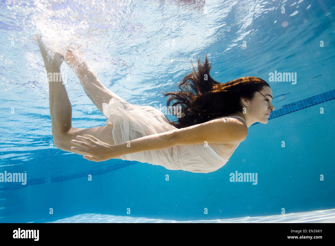 USA, Utah, Orem, Young woman swimming in swimming pool Stock Photo - Alamy