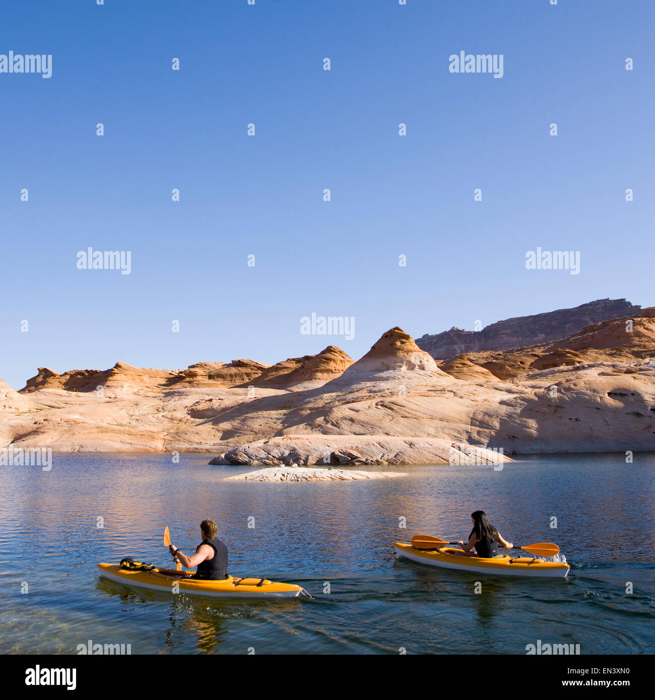 two people in kayaks on the lake Stock Photo - Alamy