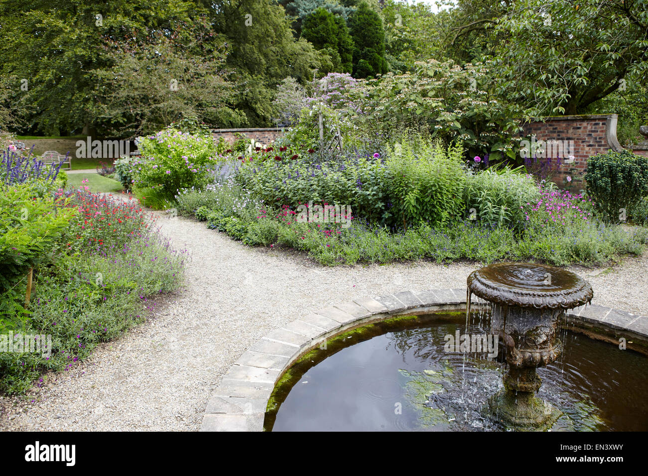 fountain in english country garden Stock Photo - Alamy