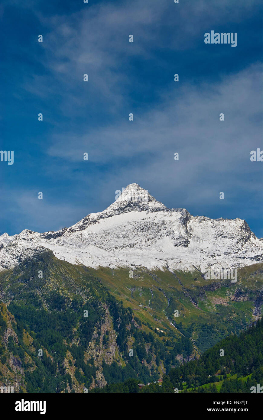 The Italian alps in summer with a snow capped peak Stock Photo - Alamy
