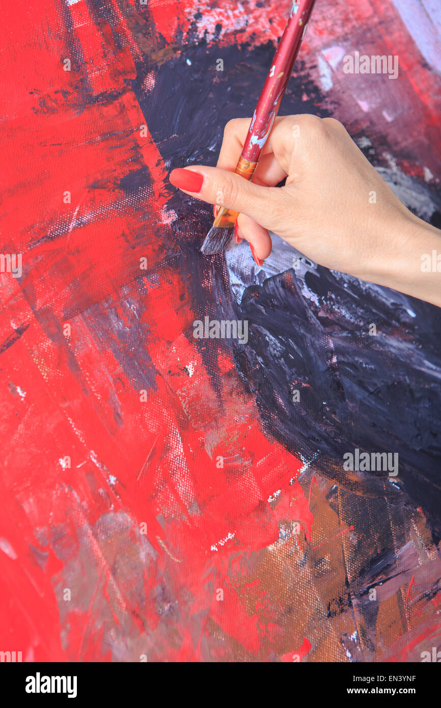closeup of female painters hand at work Stock Photo Alamy
