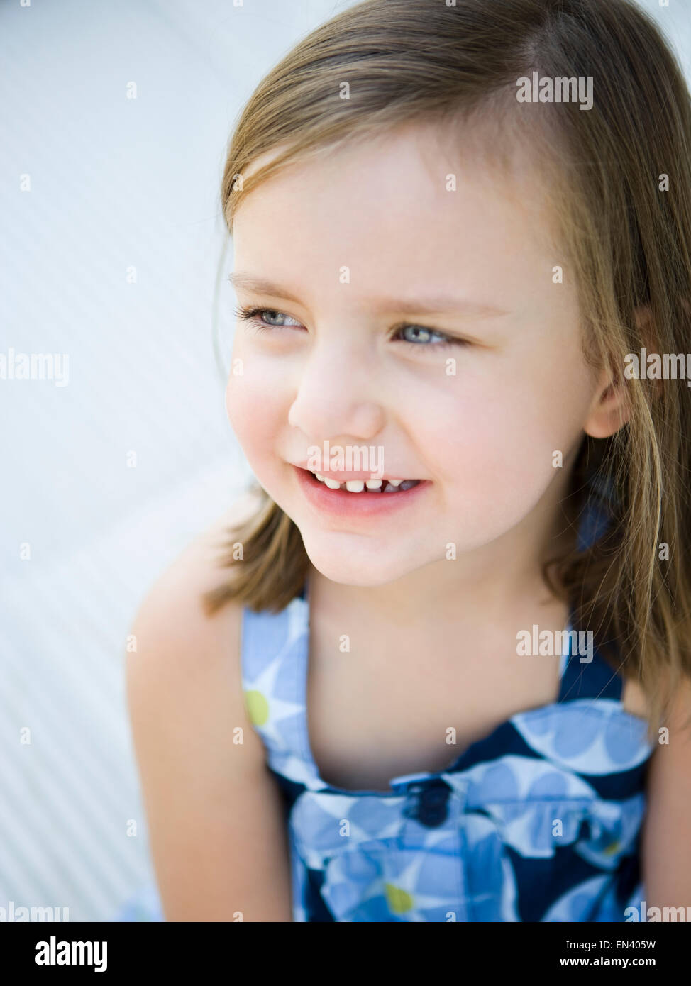 little girl in a blue dress Stock Photo - Alamy