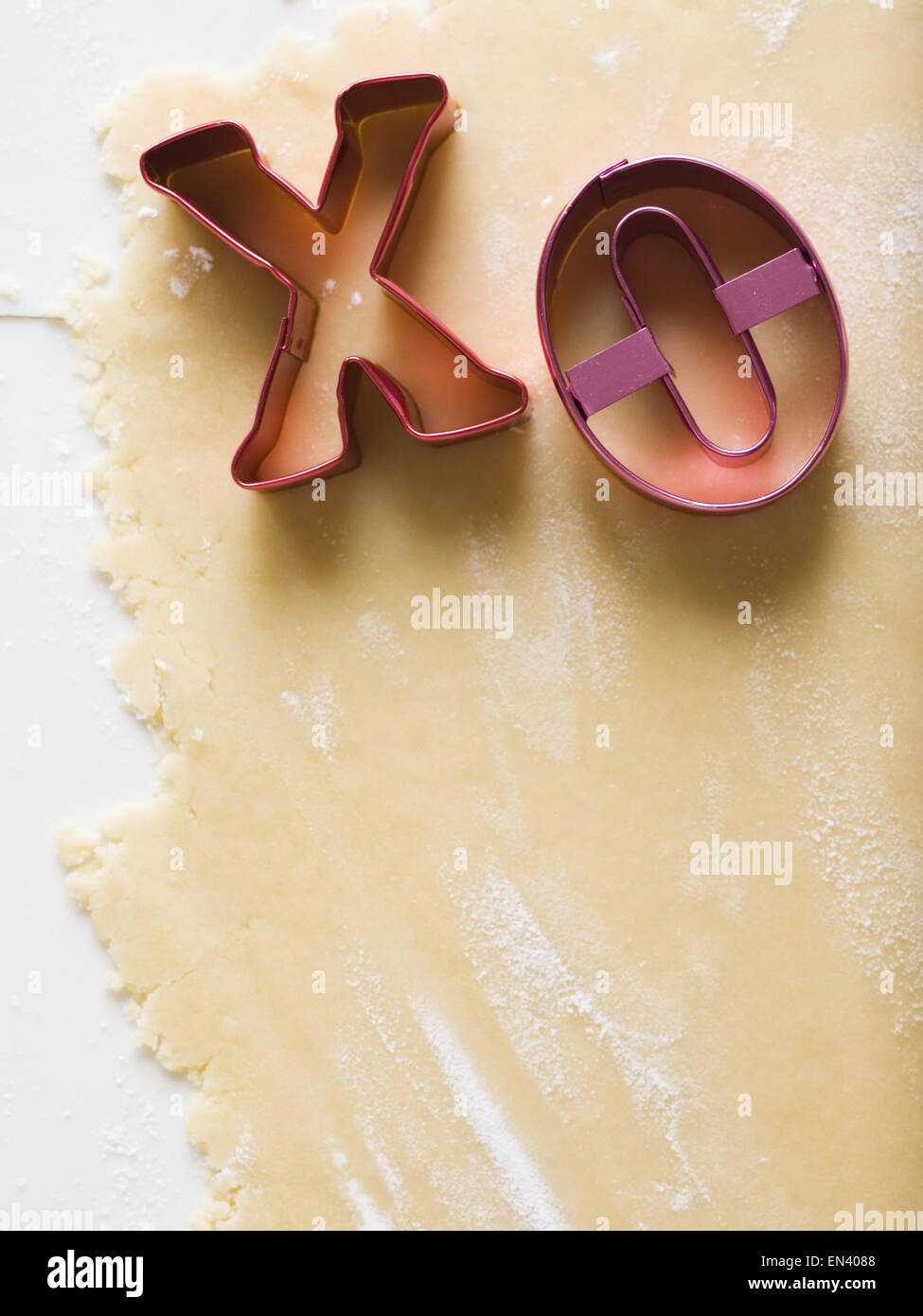 Detailed view of dough with X and O Stock Photo