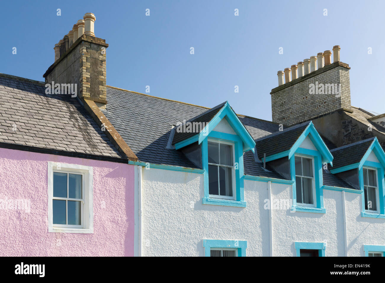 Brightly painted harbor cottages at Portpatrick, Dumfries and galloway, Scotland. Stock Photo