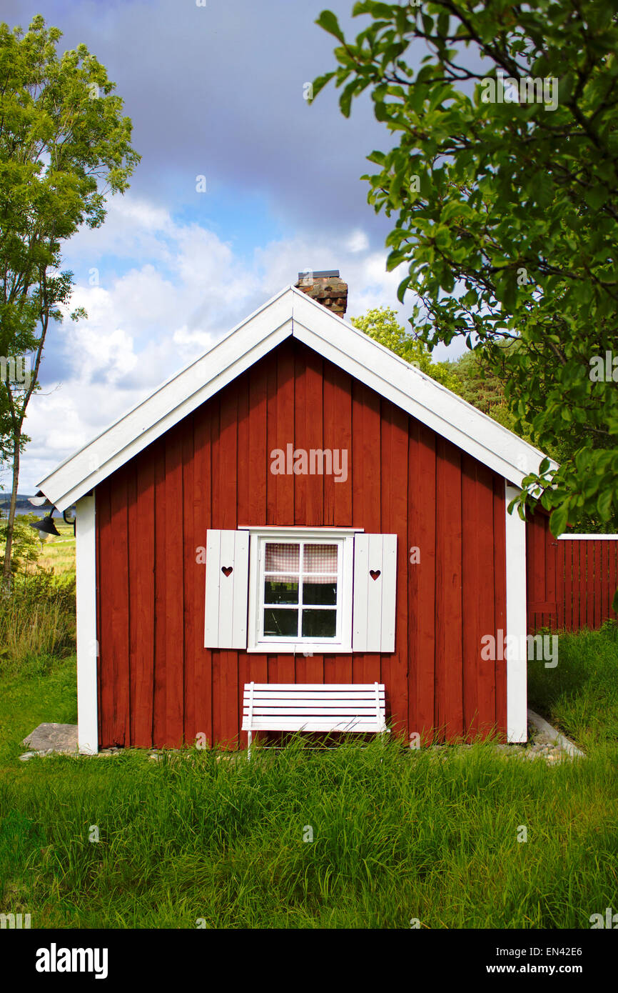 Wooden small house with grass Stock Photo