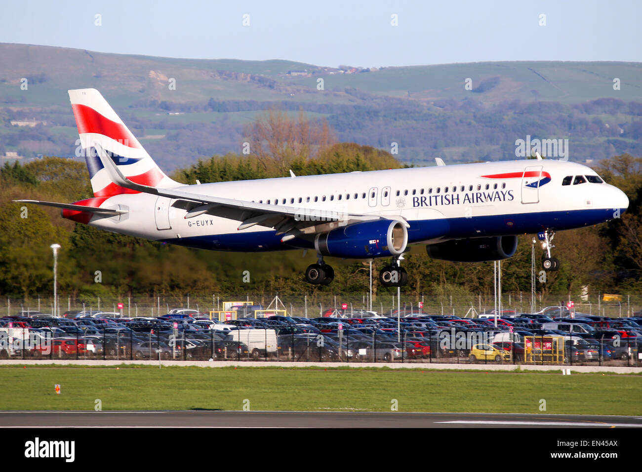 British Airways Airbus A320 approaches runway 23R at Manchester airport. Stock Photo