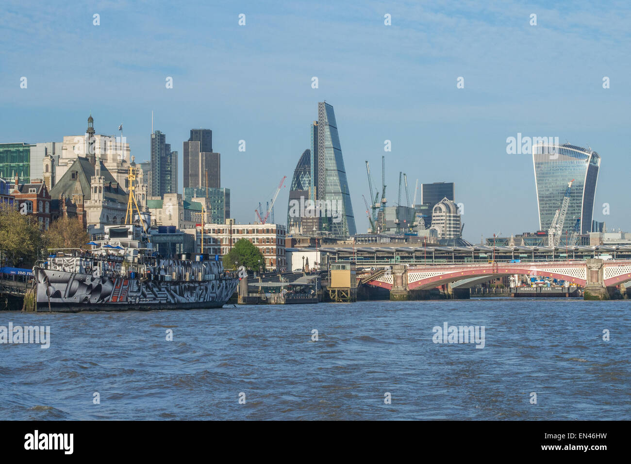 River Thames showing Blackfriars Bridge and  the First World War ship HMS President (1918). Stock Photo