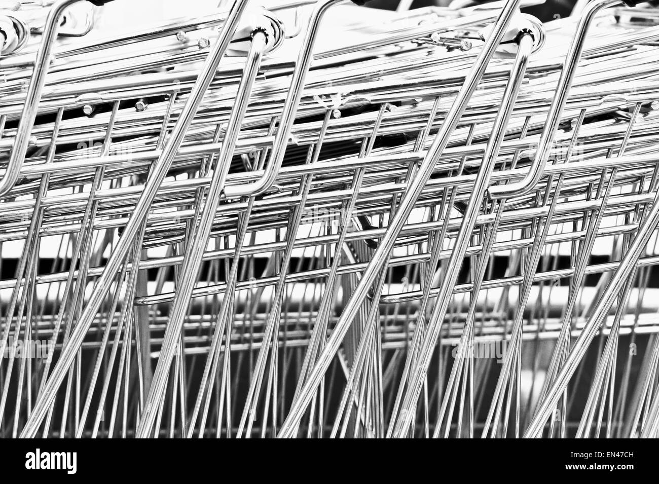 Close up of metal shopping trolleys making an abstract pattern Stock Photo