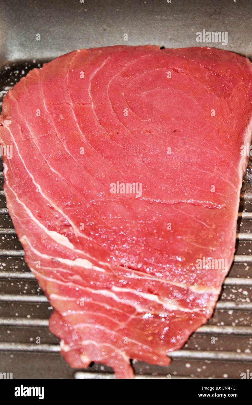 Raw tuna steak grilled Stock Photo - Alamy