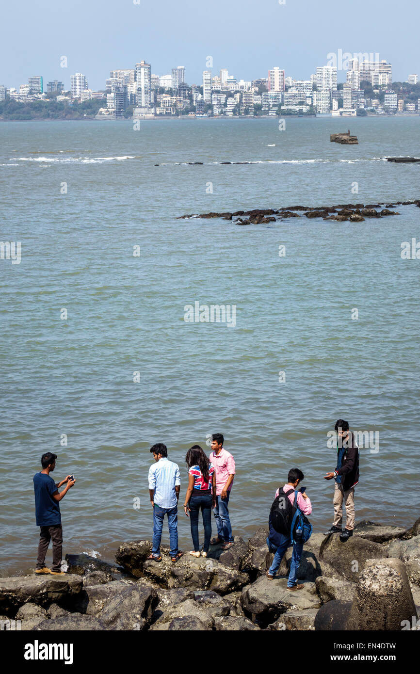 Mumbai India,Indian Asian,Churchgate,Marine Drive,Back Bay water,Arabian Sea water,teen teens teenage teenager teenagers youth adolescent,male boy boy Stock Photo