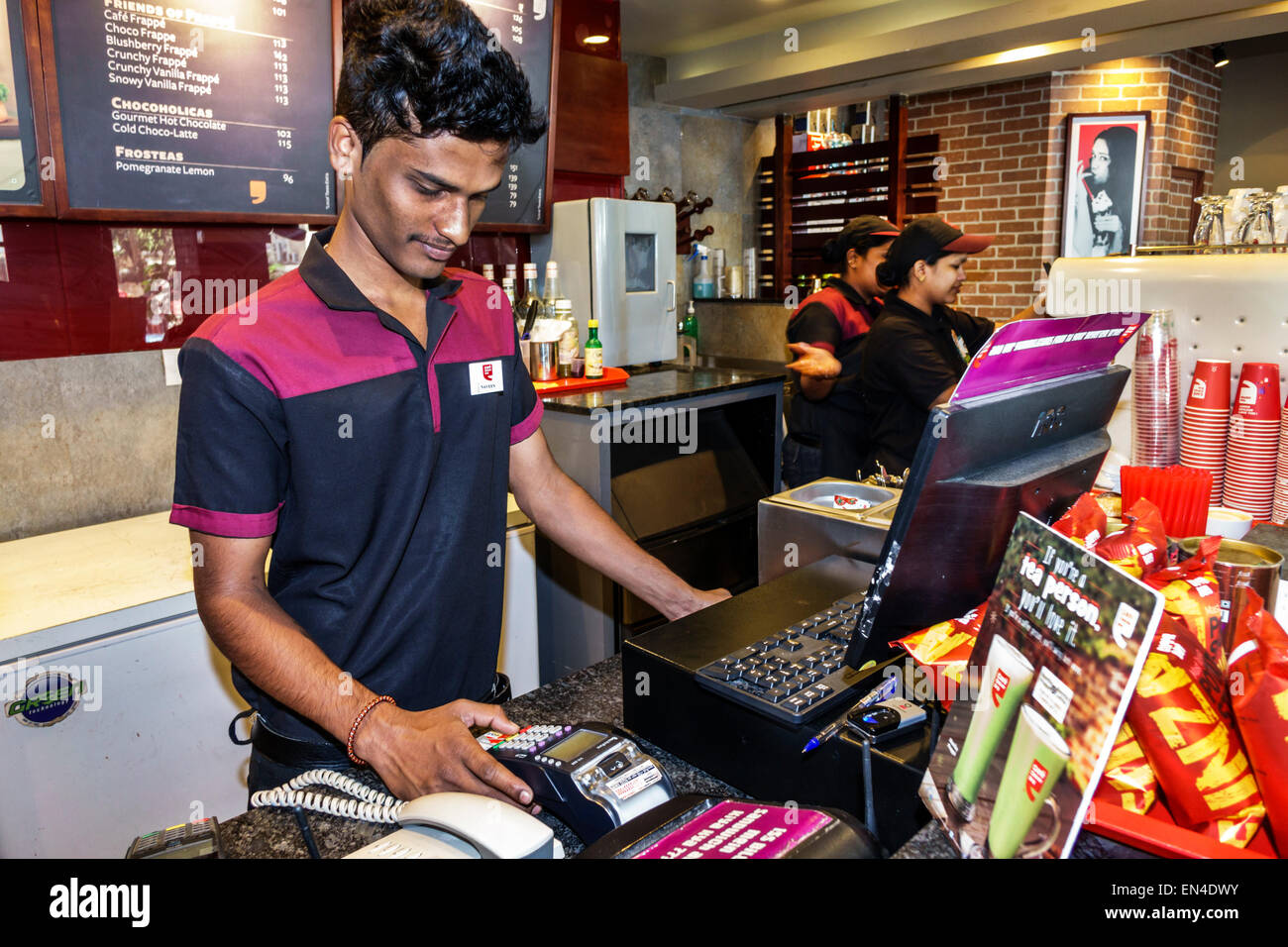 Mumbai India,Churchgate,Jamshedji Tata Road,Cafe Coffee Day,restaurant restaurants food dining cafe cafes,interior inside,counter,man men male,employe Stock Photo