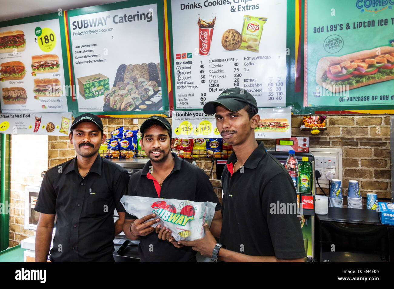Mumbai India,Churchgate,Jamshedji Tata Road,subway,train,sandwich shop,restaurant restaurants food dining cafe cafes,man men male,working work worker Stock Photo
