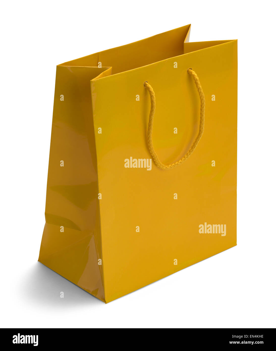 Shiny Yellow Retail Shopping Bag Isolated on a White Background. Stock Photo