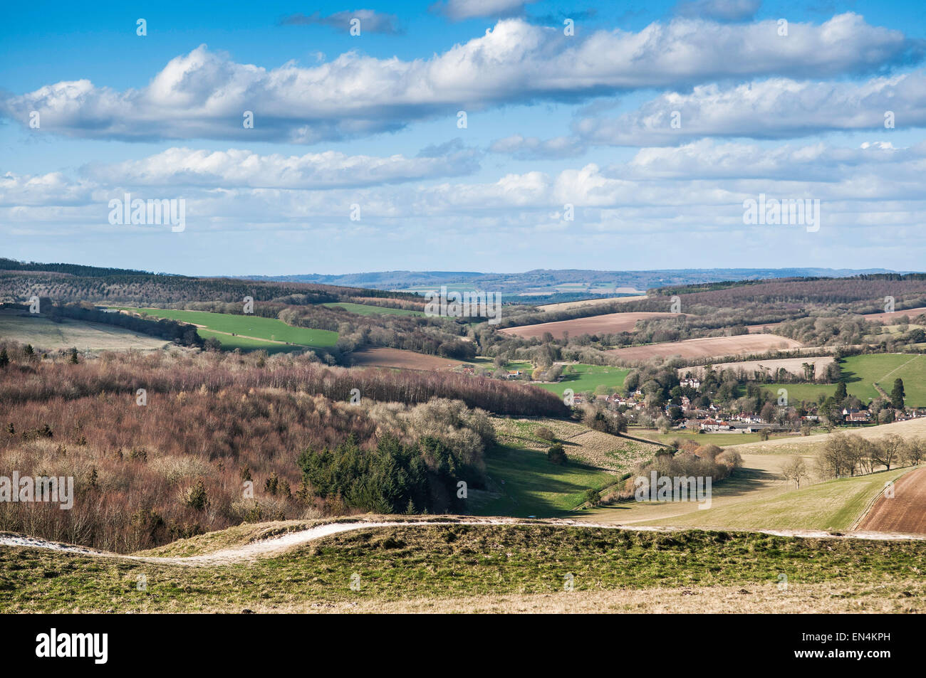 View from the Trundle in late winter over the South Downs towards the village of Singleton ,West Sussex. England UK Stock Photo