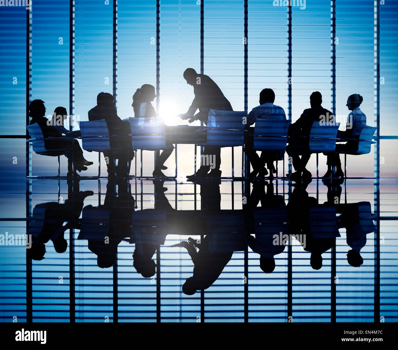 Silhouettes of business people in a conference room Stock Photo Alamy