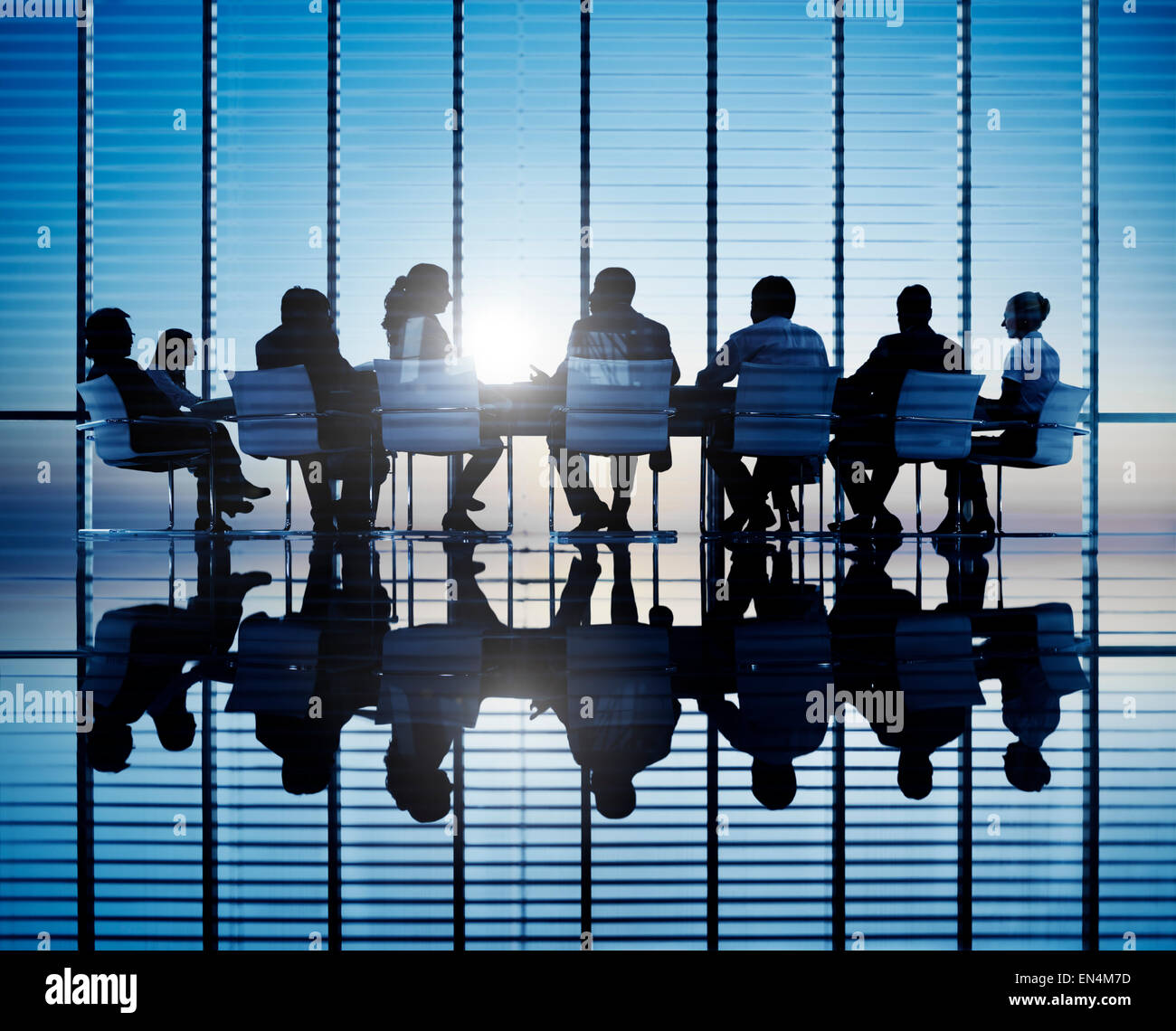 Silhouettes of business people in a conference room Stock Photo Alamy