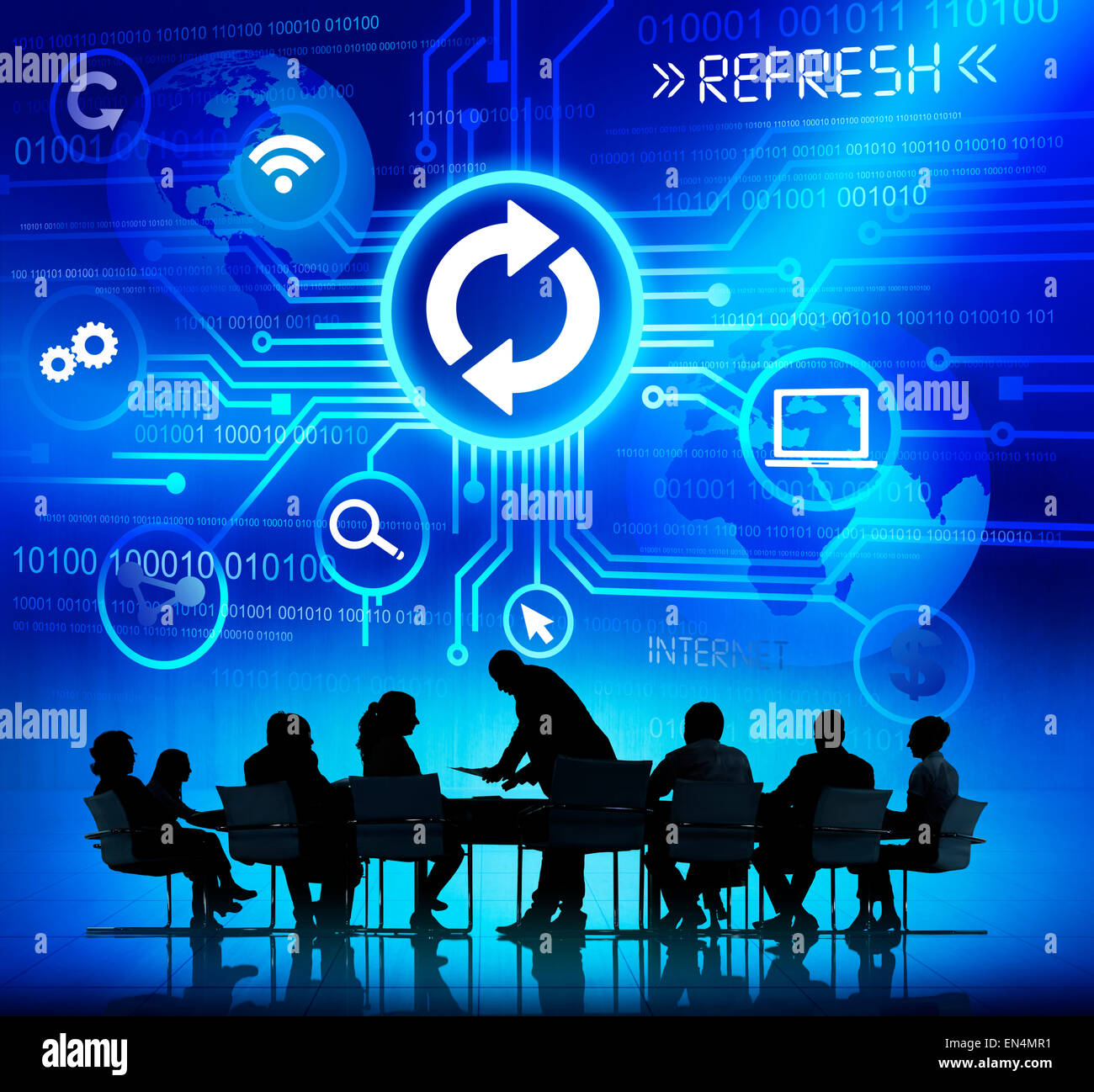 Silhouettes of Business People Working with Computer Concept Symbols Above Stock Photo