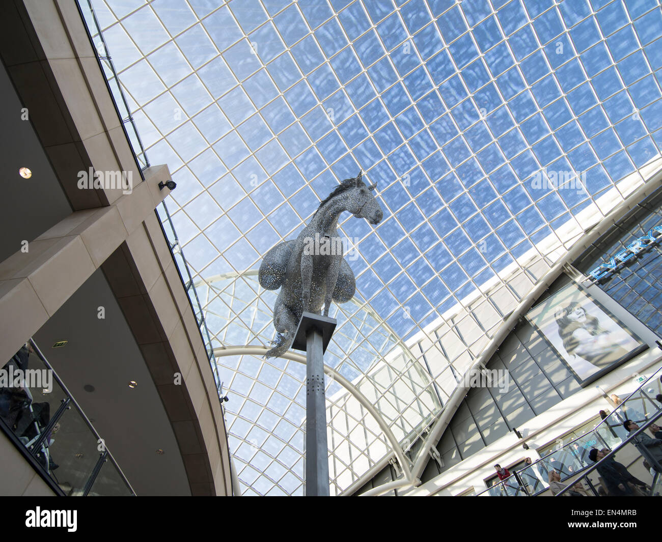 The sculpture Equus Altus - a packhorse carrying cloth at Trinity Leeds - Shopping Center, Yorkshire, England. Stock Photo
