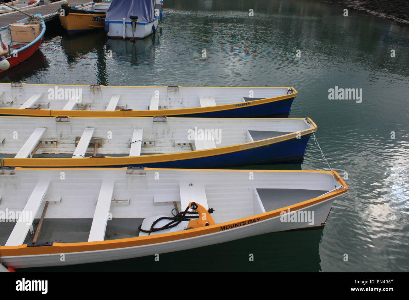 pilot gig boats moored in newlyn harbour Stock Photo