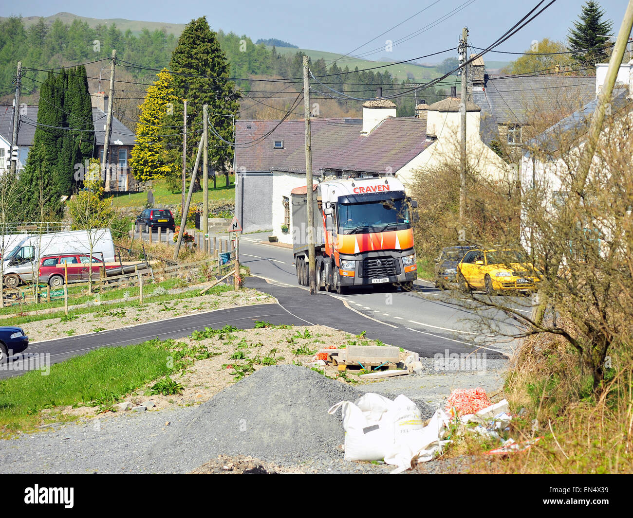 An articulated lorry drives through the Mid Wales village of Ysbyty Ystwyth in Ceredigion. Stock Photo