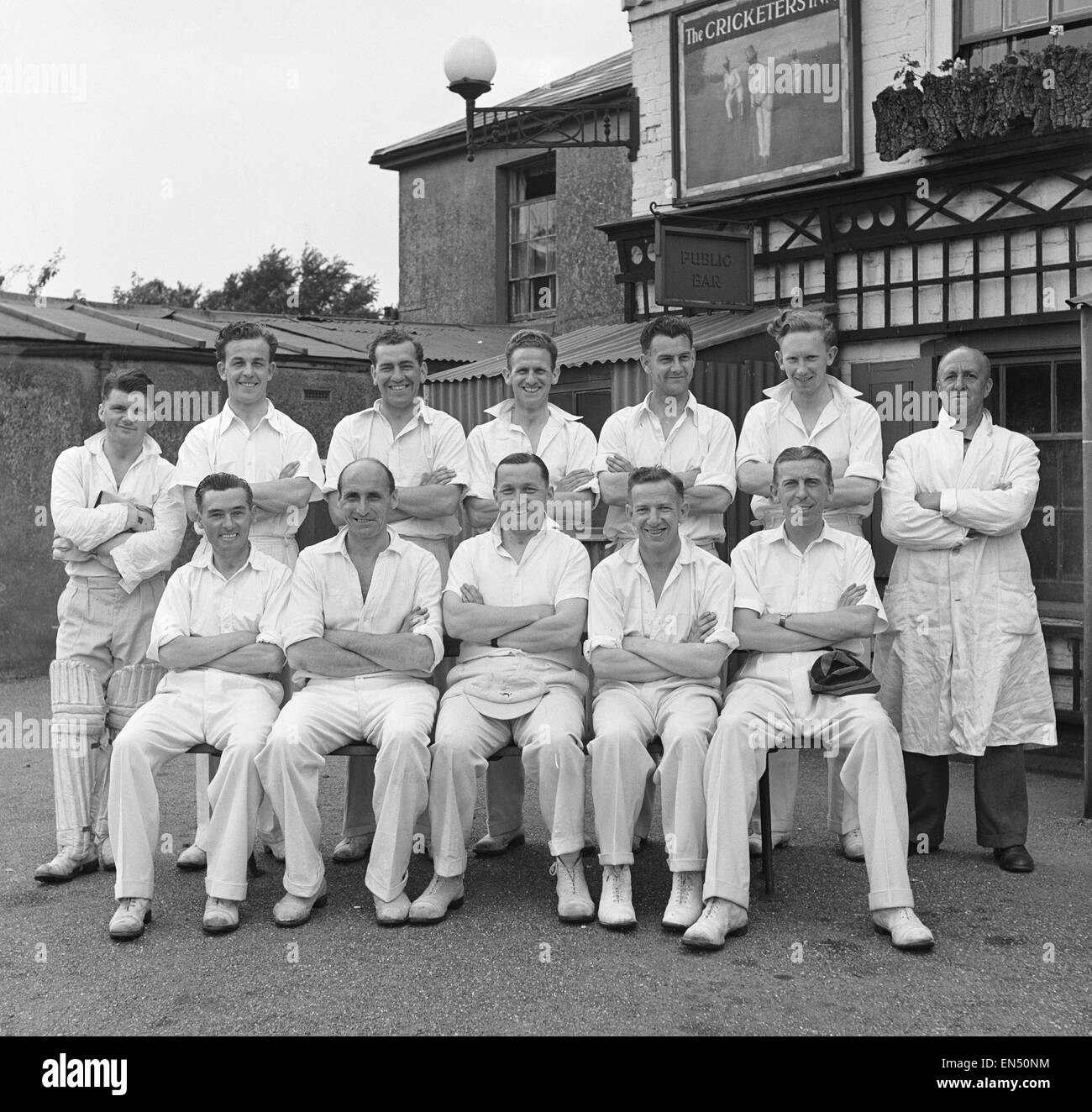 The local cricket team at Meopham one of the oldest teams in Kent seen here posing for a team picture outside The Cricketers public house Circa June 1950 Stock Photo