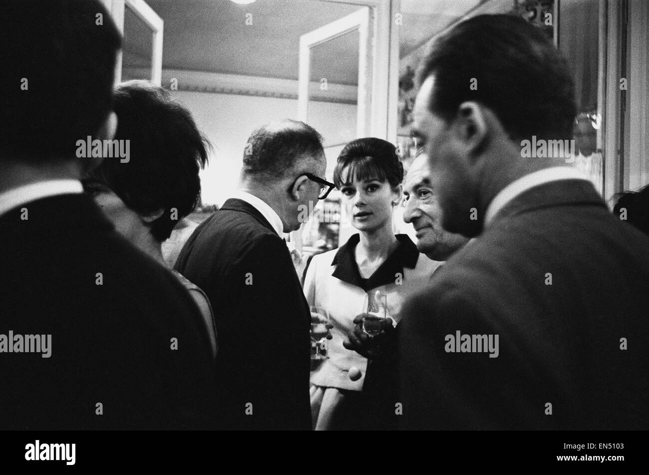 Actress Audrey Hepburn pictured at a party in Paris, France. 17th August 1961. Stock Photo