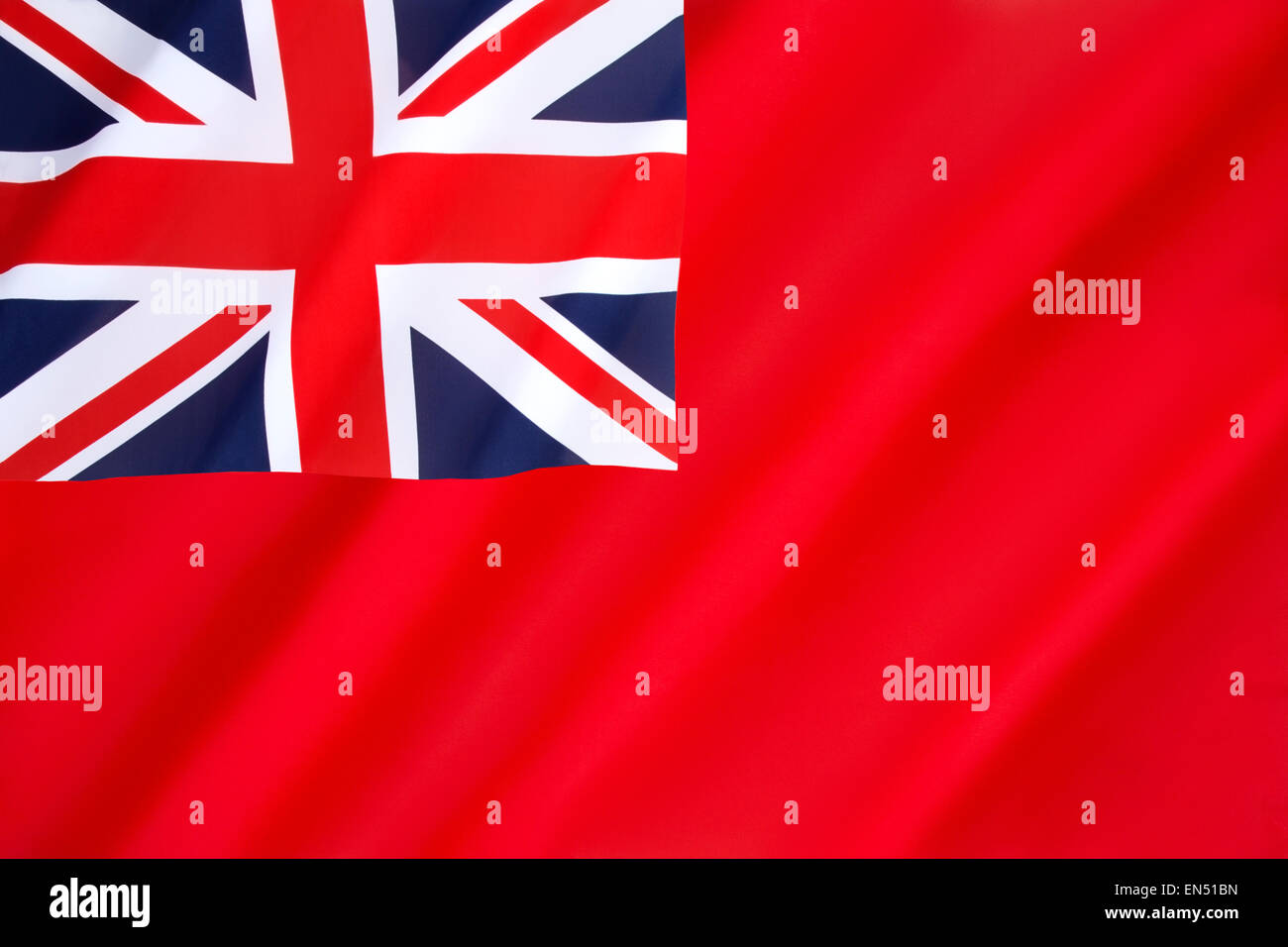 The British Red Ensign - flown by British-registered ships. Stock Photo