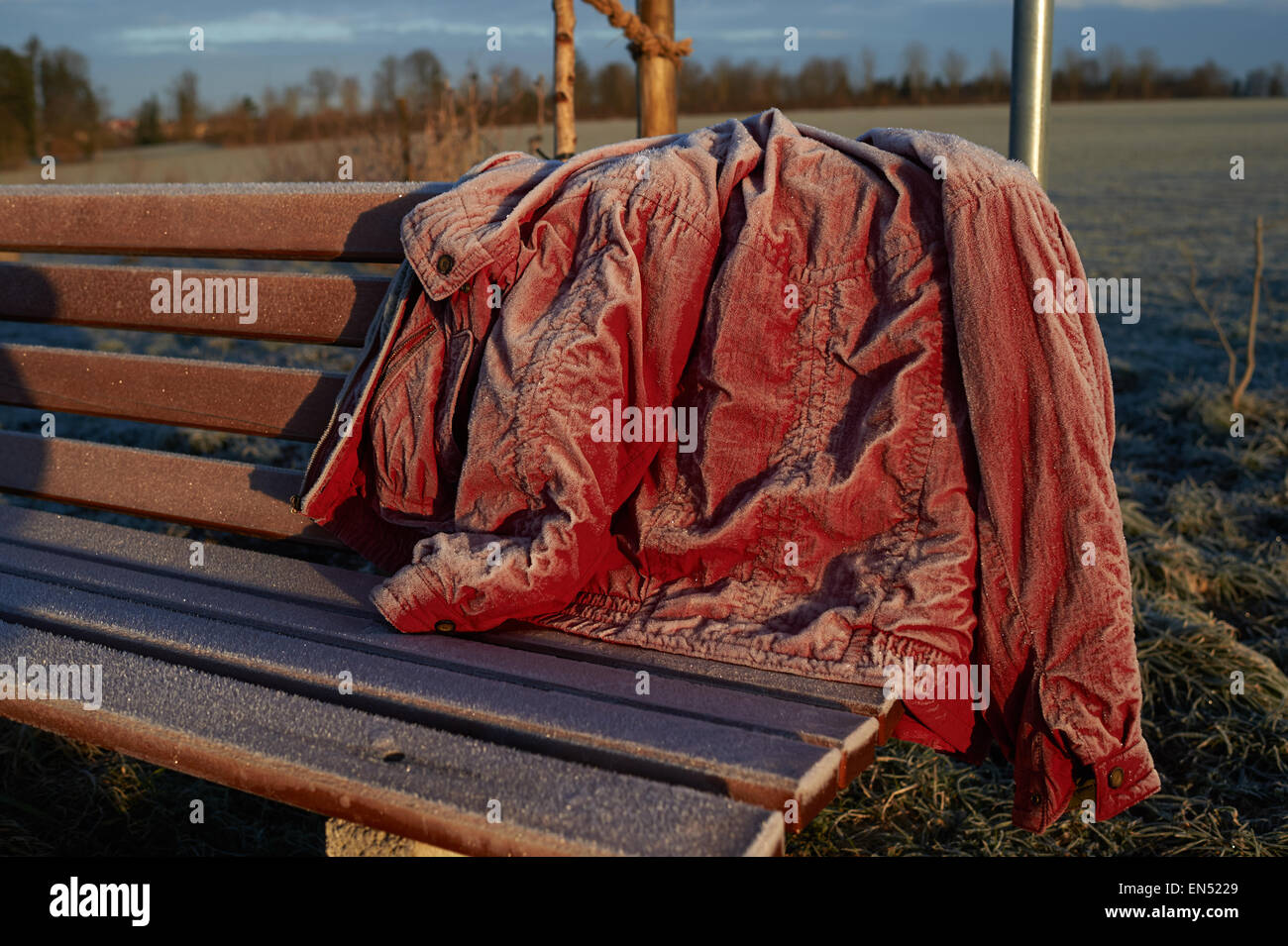 Frozen Jacket left outside over night in the frost Stock Photo - Alamy