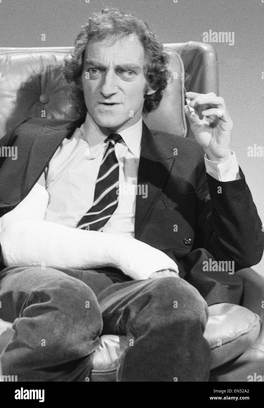 Zany comedian Marty Feldman seen here on the set of his new television series, 'The Comedy Machine' at Elstree Studios. Marty's arm is in plaster after he fell 20ft from some curtains whilst filming. The fall resulted in Marty breaking his arm in two plac Stock Photo