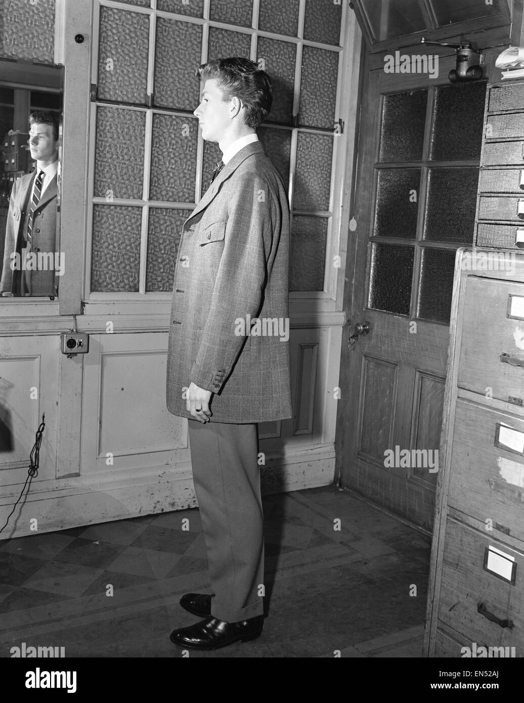 Youth modelling the latest fashion Edwardian suits. 11th November 1955 Stock Photo