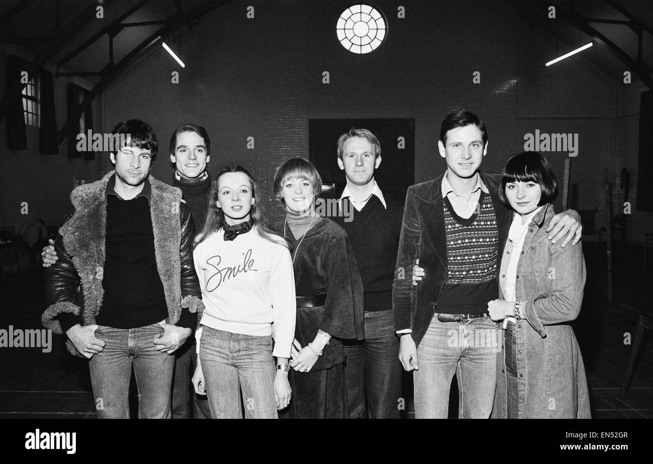 Rehearsal for the new London Weekend television drama series 'Love for Lydia'. Left to right are cast members: Ralph Arliss, Jeremy Irons, Irene Richard, Sherrie Hewson, Peter Davidson, Christopher Blake and Mel Martin. 16th December 1976. Stock Photo