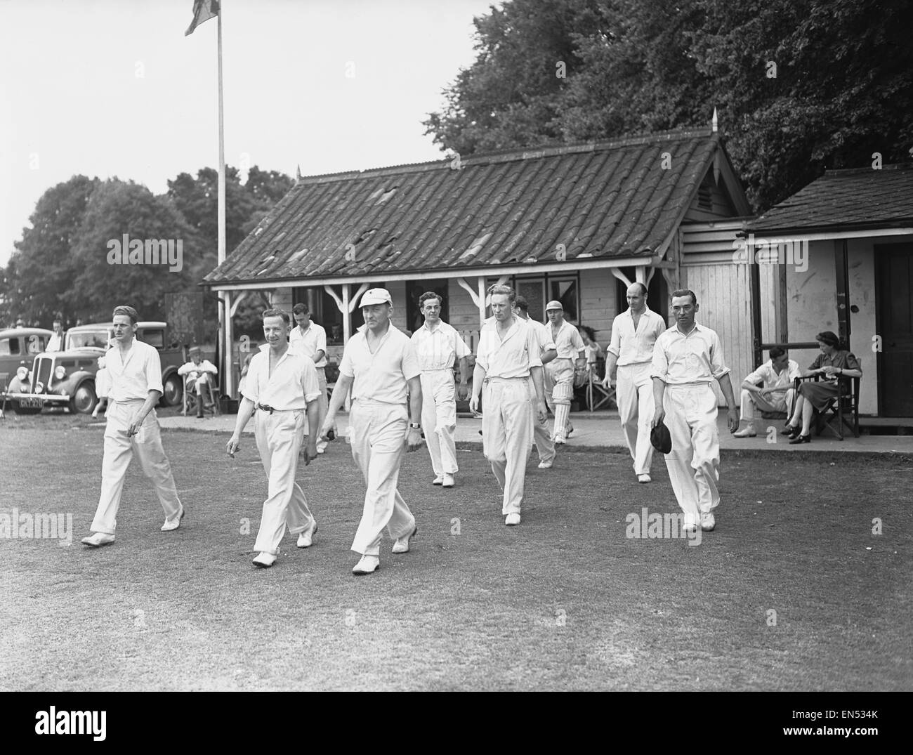 The local cricket team at Meopham one of the oldest teams in Kent seen taking to the field Circa June 1950 Stock Photo