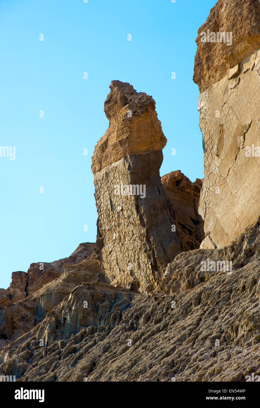 Big rock close to the banks of the dead sea which is called 'Lot's wife' Stock Photo