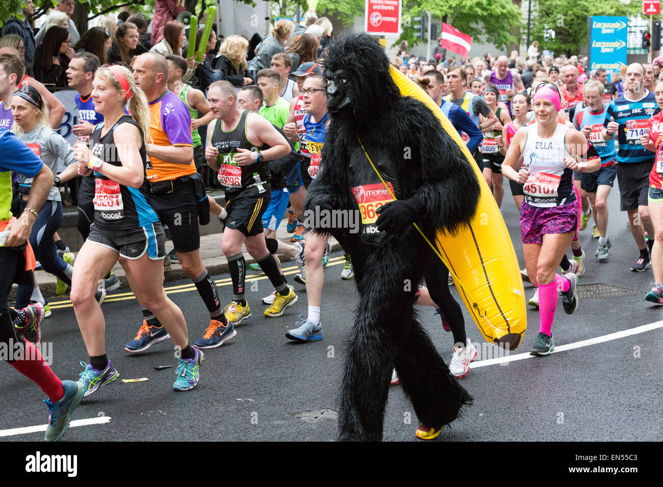 Man dressed in a gorilla suit running at the 2015 Virgin Money London Marathon Stock Photo