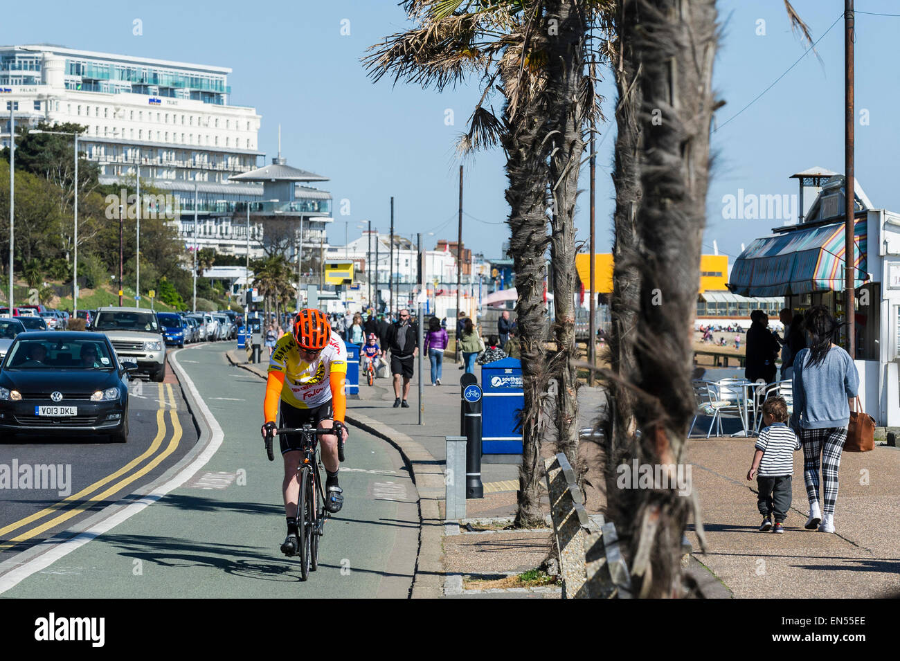 A cyclist using the cycle lane on the seafront in Southend, Essex. Stock Photo