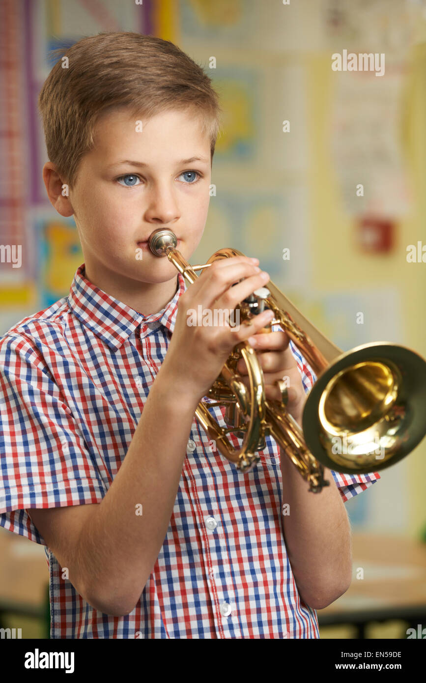 Talented boy playing the trumpet hi-res stock photography and images - Alamy