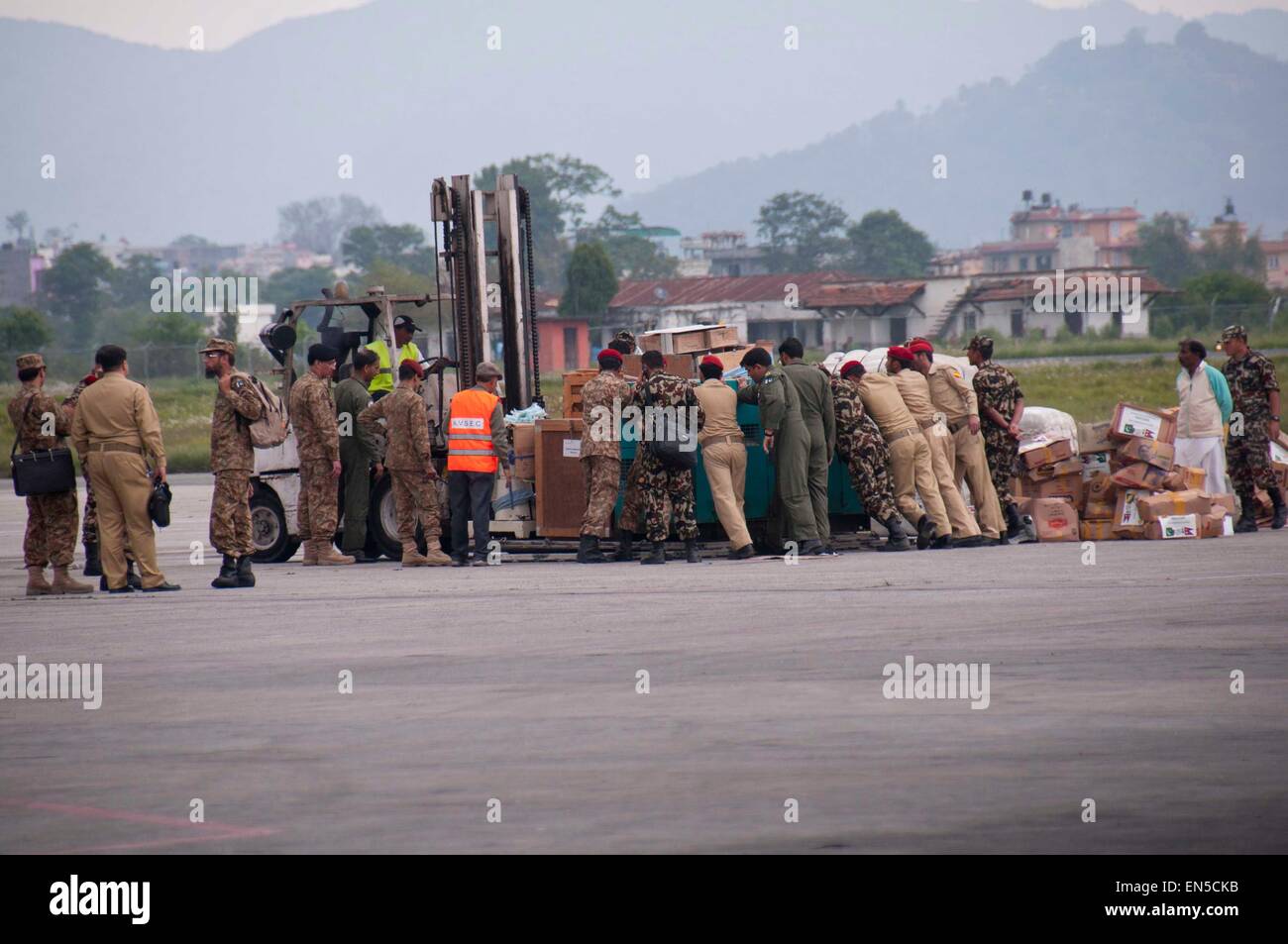 Kathmandu, Nepal. 28th Apr, 2015. International rescue teams arrive at Tribhuvan International Airport in Kathmandu, Nepal, April 28, 2015. The death toll from a powerful earthquake in Nepal soared to 4,555 and a total of 8,299 others were injured, the Nepal Police said. Various international rescue teams performed relief operations in affected regions. Credit:  Pratap Thapa/Xinhua/Alamy Live News Stock Photo