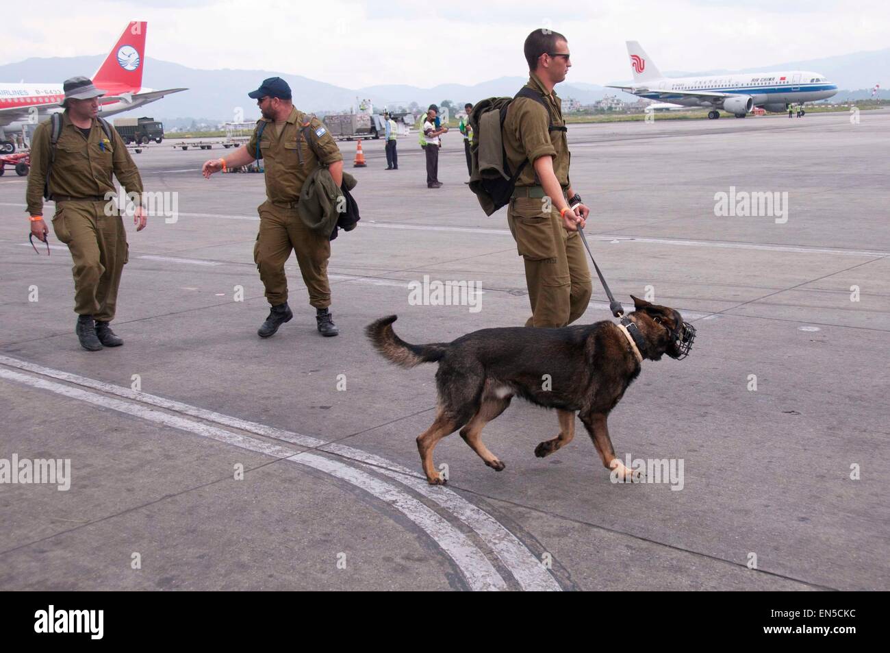 Kathmandu, Nepal. 28th Apr, 2015. An international rescue team arrives at Tribhuvan International Airport in Kathmandu, Nepal, April 28, 2015. The death toll from a powerful earthquake in Nepal soared to 4,555 and a total of 8,299 others were injured, the Nepal Police said. Various international rescue teams performed relief operations in affected regions. Credit:  Pratap Thapa/Xinhua/Alamy Live News Stock Photo