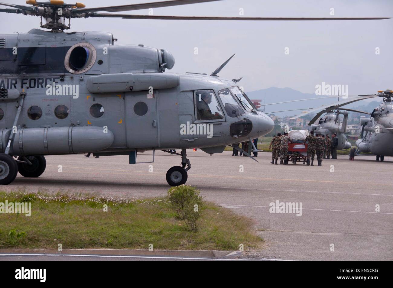 Kathmandu, Nepal. 28th Apr, 2015. International rescue teams arrive at Tribhuvan International Airport in Kathmandu, Nepal, April 28, 2015. The death toll from a powerful earthquake in Nepal soared to 4,555 and a total of 8,299 others were injured, the Nepal Police said. Various international rescue teams performed relief operations in affected regions. Credit:  Pratap Thapa/Xinhua/Alamy Live News Stock Photo