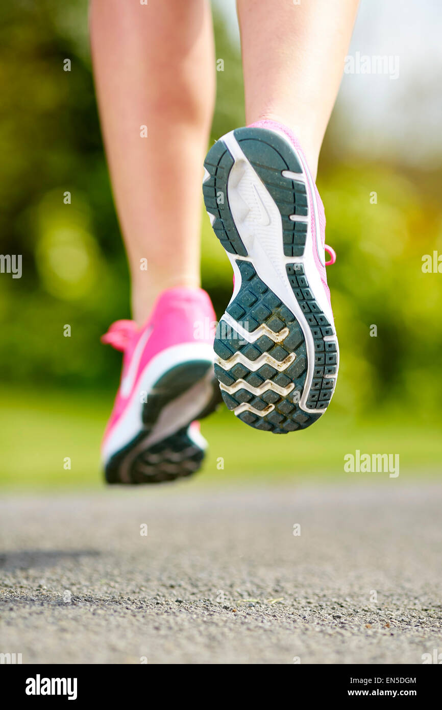 Athletic Female Running On White Background Stock Photo - Download Image  Now - Running, Women, One Woman Only - iStock