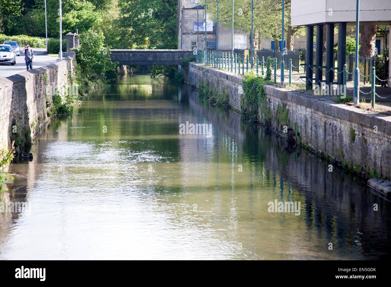 River Marden flowing in straightened channel, Calne, Wiltshire, England, UK Stock Photo