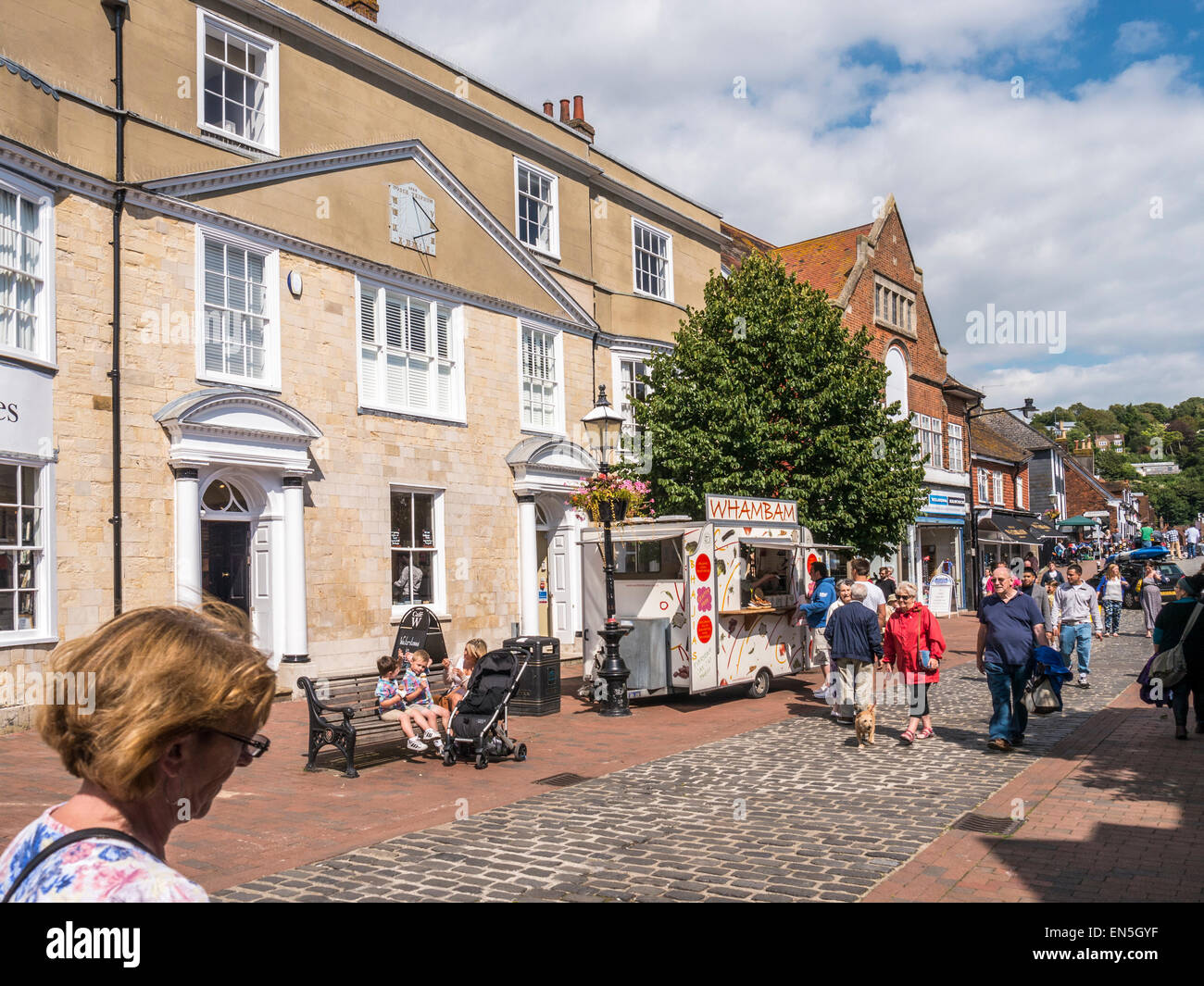 Part of the main High Street in Lewes leading towards the River Ouse & Cliffe High Street, Lewes, East Sussex. Stock Photo