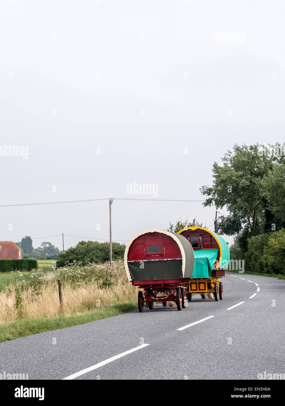 Two Romani caravans traveling the roads of Kent near Romney Marsh. Stock Photo
