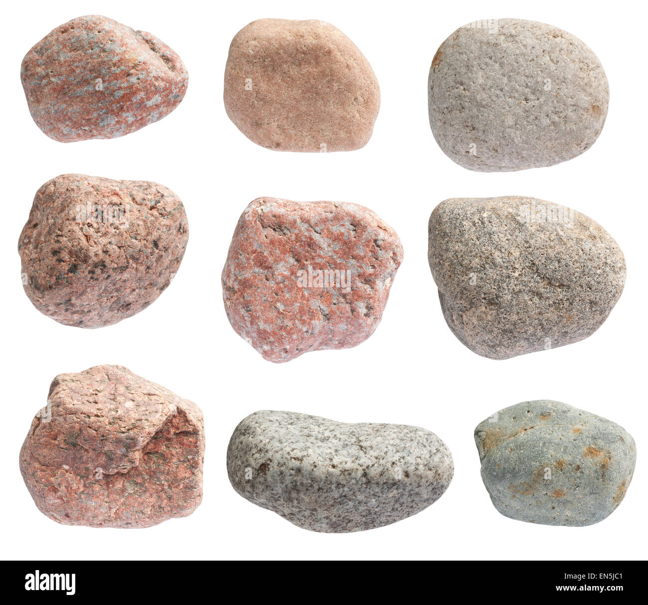 Various color river stones are isolated on white background Stock Photo