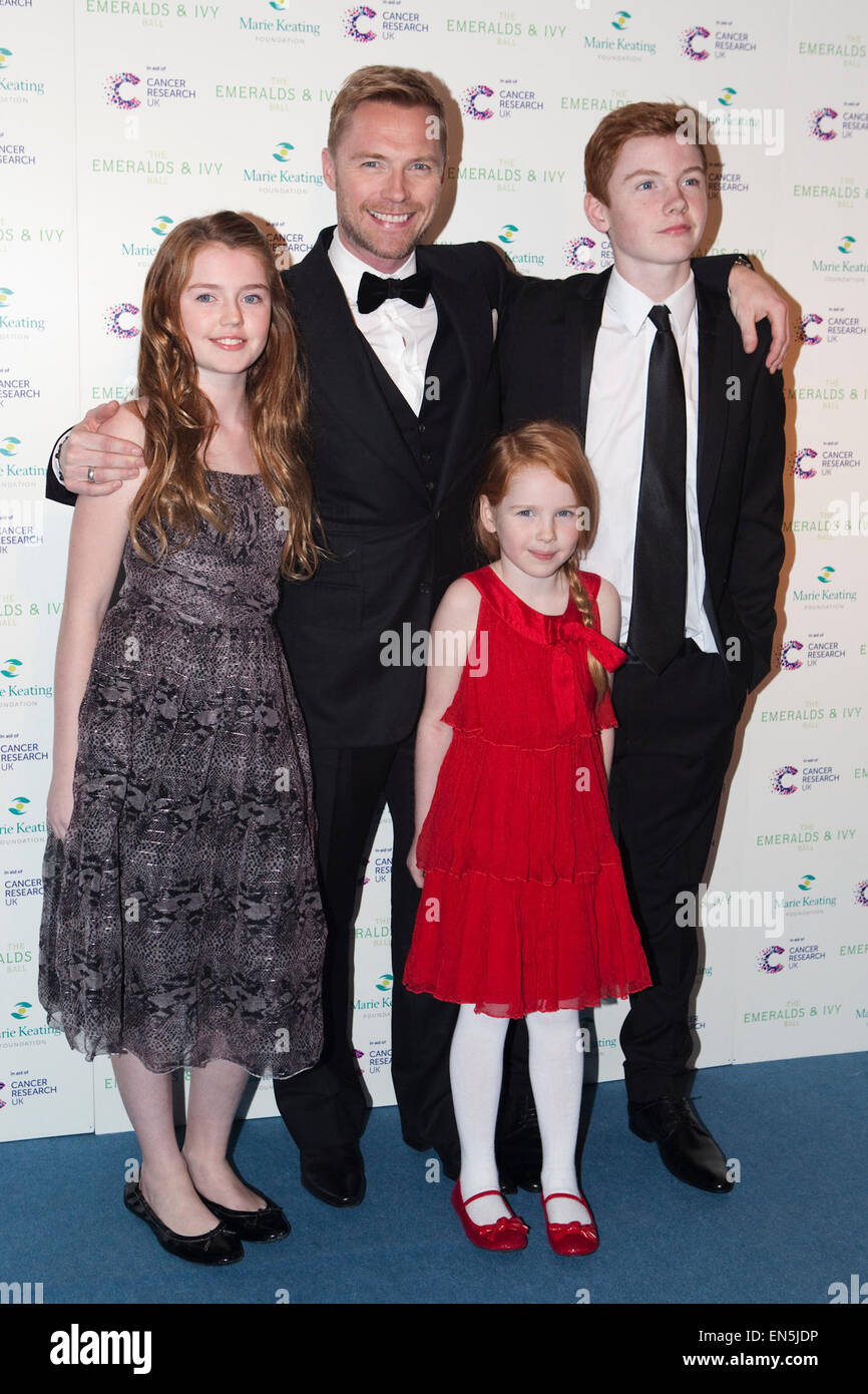Ronan Keating (centre, top) and his children Jack, 13, Missy, 11 and Ali, 7 attend the annual Emeralds and Ivy Ball at Supernova in Embankment Gardens, London in aid of Cancer Research UK and the Marie Keating Foundation. Stock Photo