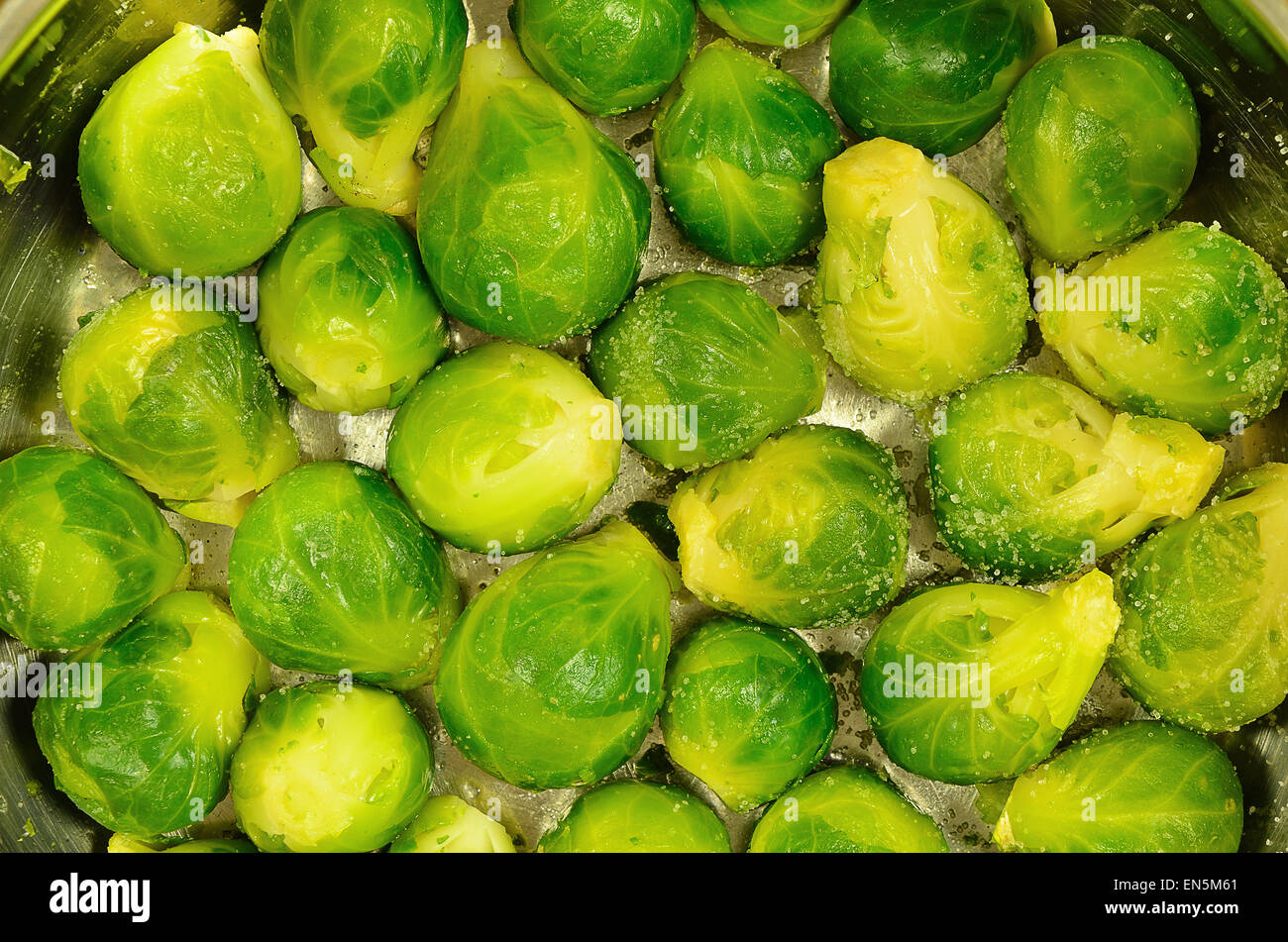 Brussels sprouts, raw. in a cooking pot, close up, full frame ...